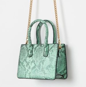 Snake print mini handbag